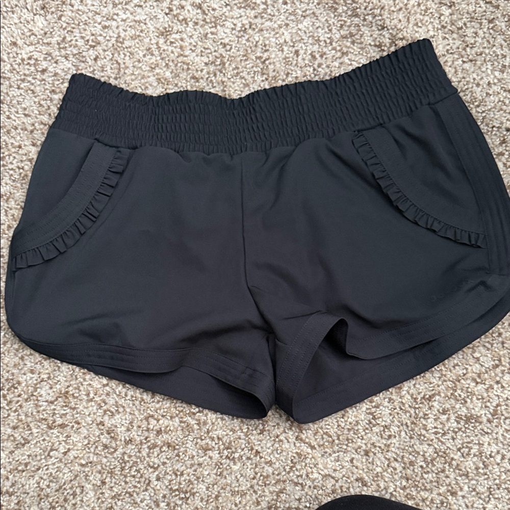 Women's Black Athletic Shorts with Elastic Smocked Waist and Ruffle-Trim Pockets
